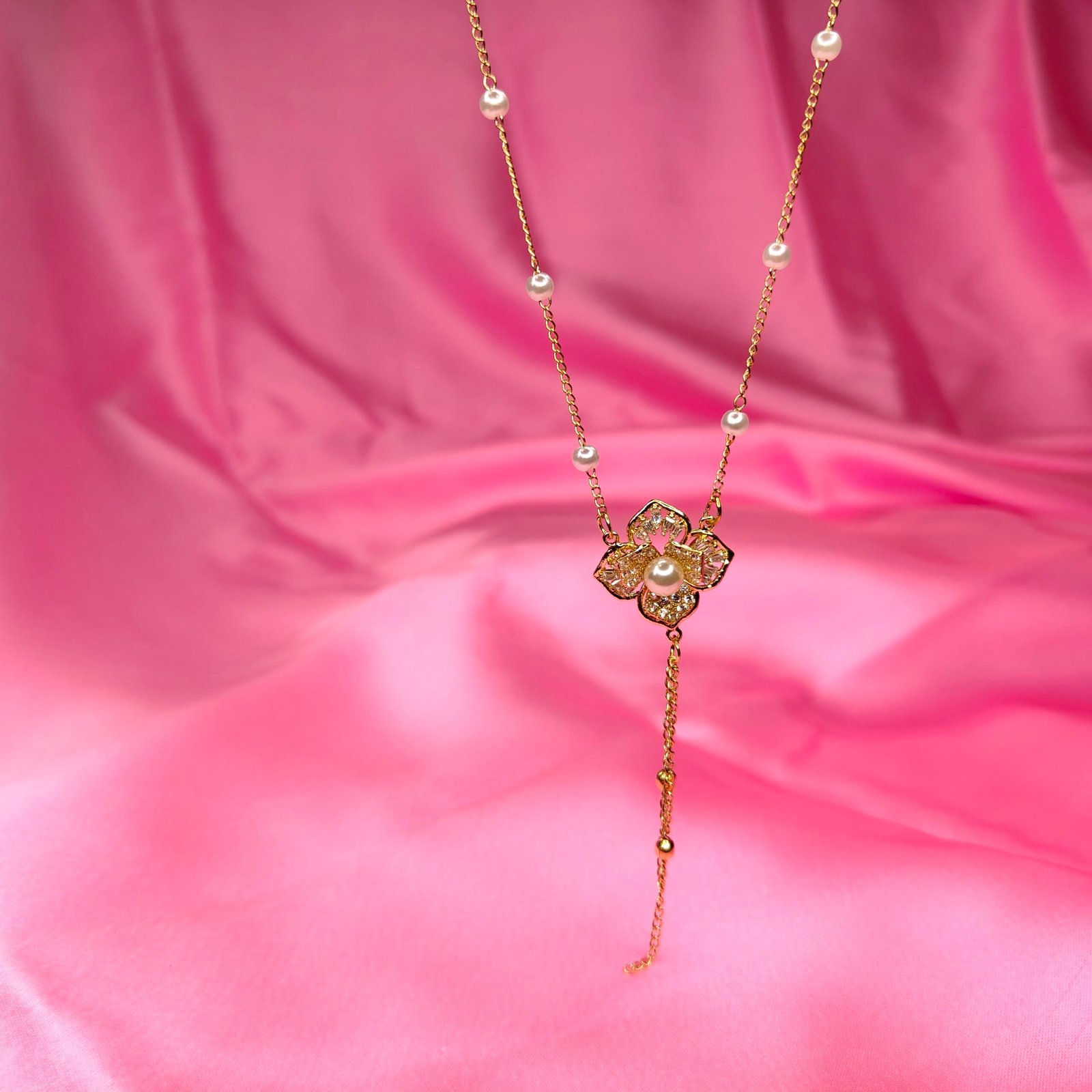 Gold-Plated Floral Pearl Pendant Necklace with CZ Accents – Elegant Lariat Design for Women lifestyle2