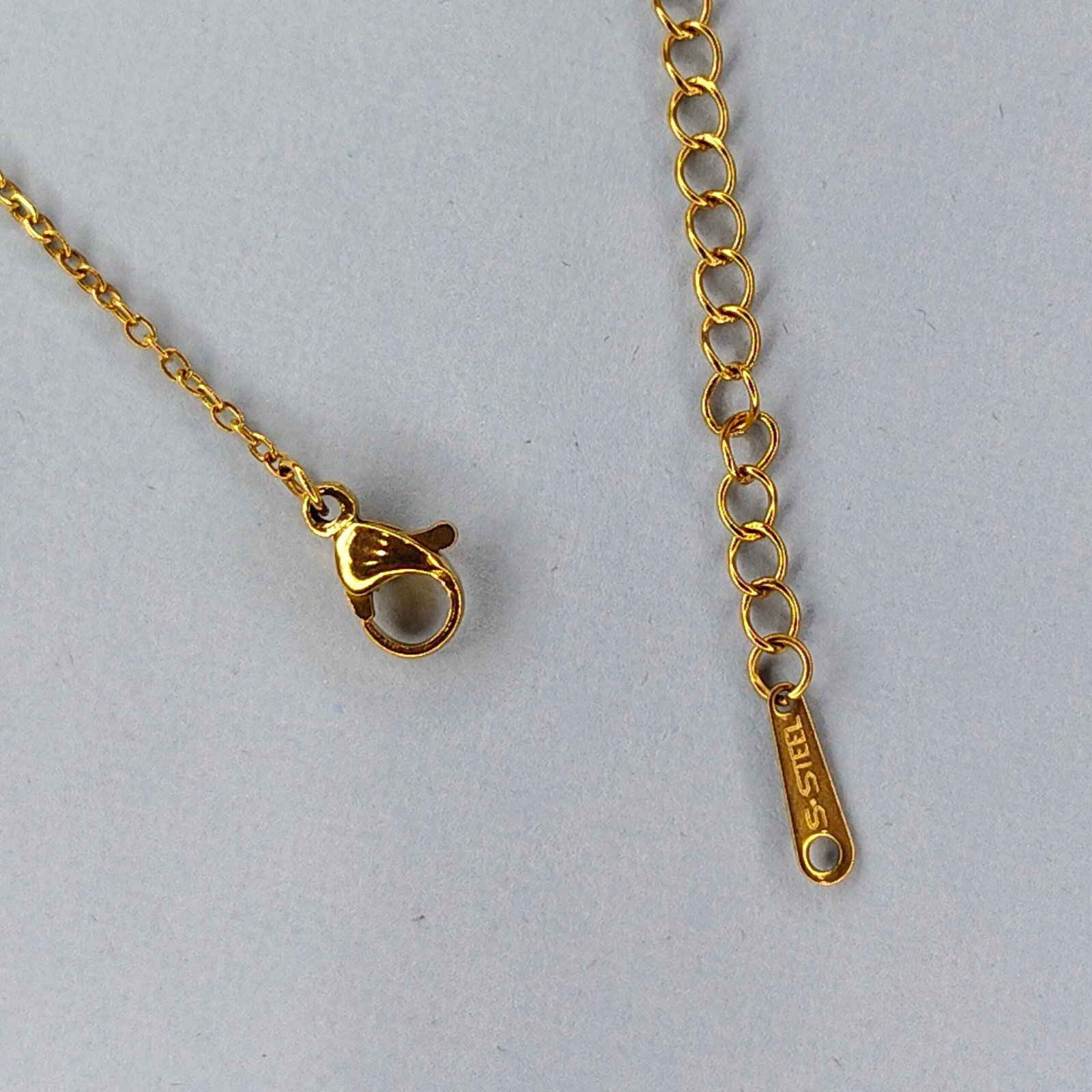 18K Gold Plated Bow Pendant Necklace with Red Teardrop Gemstone back