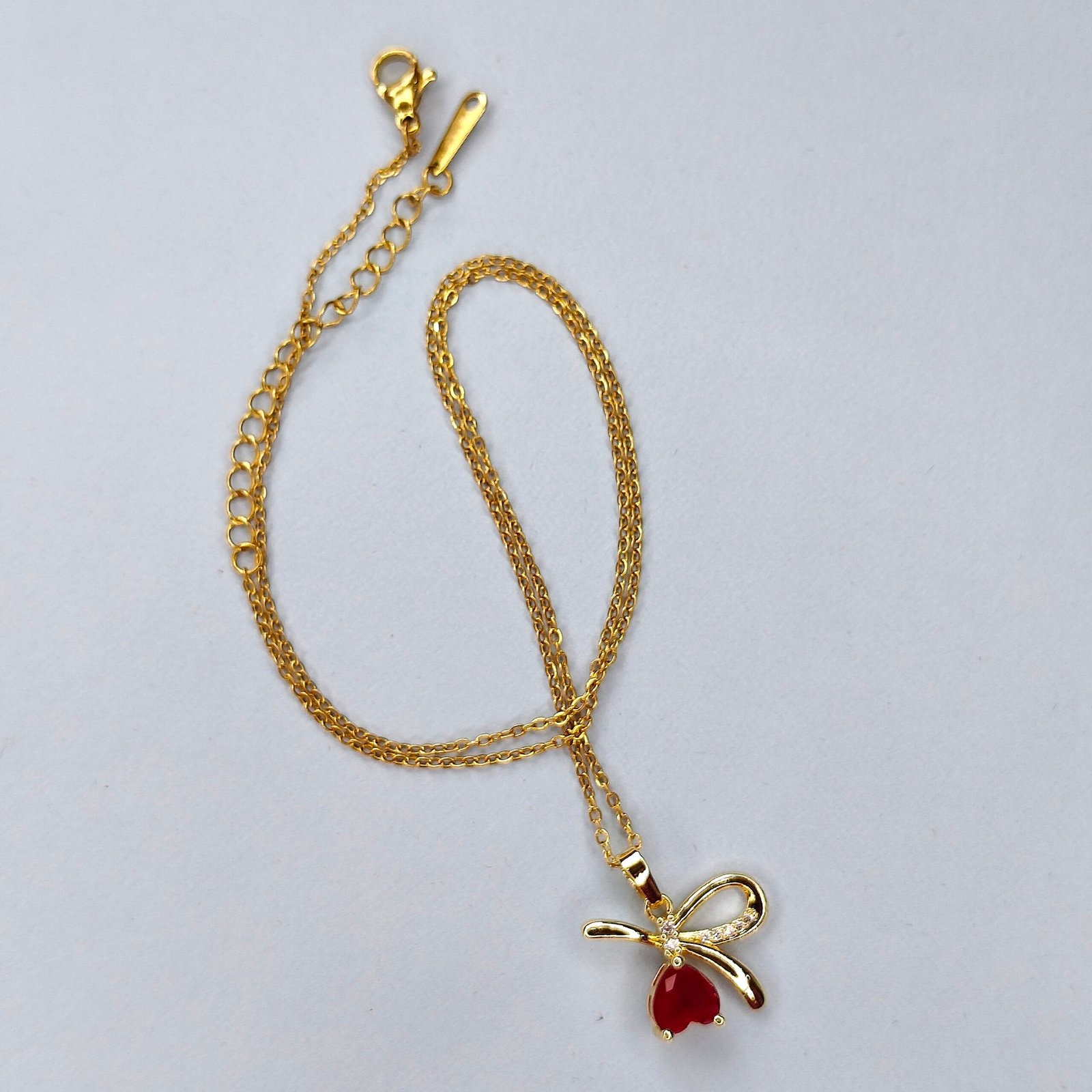 18K Gold Plated Bow Pendant Necklace with Red Teardrop Gemstone