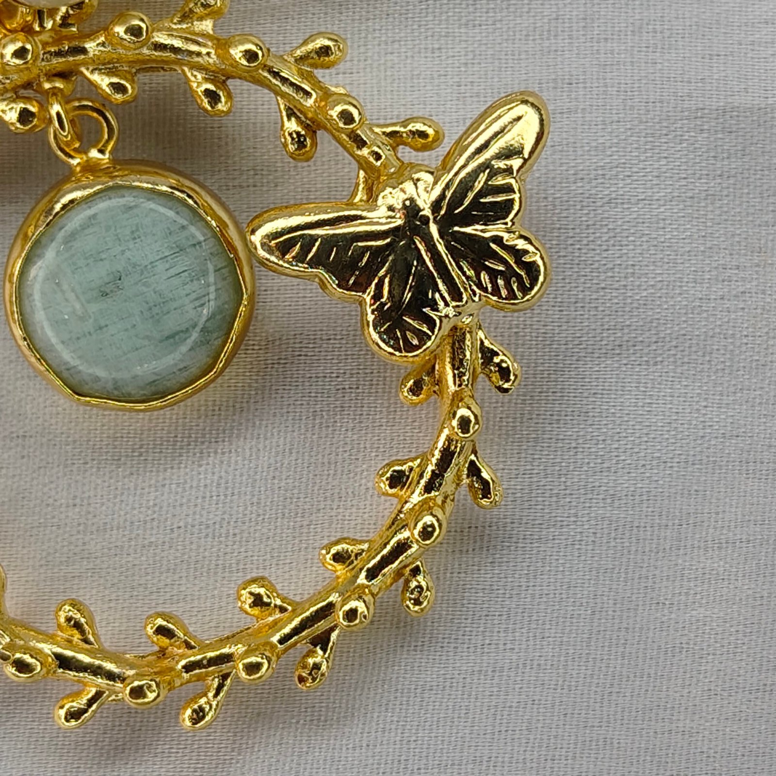 Jevaya Golden Butterfly Hoop Earrings with Mint Stone and Pearl Stud - Image 3