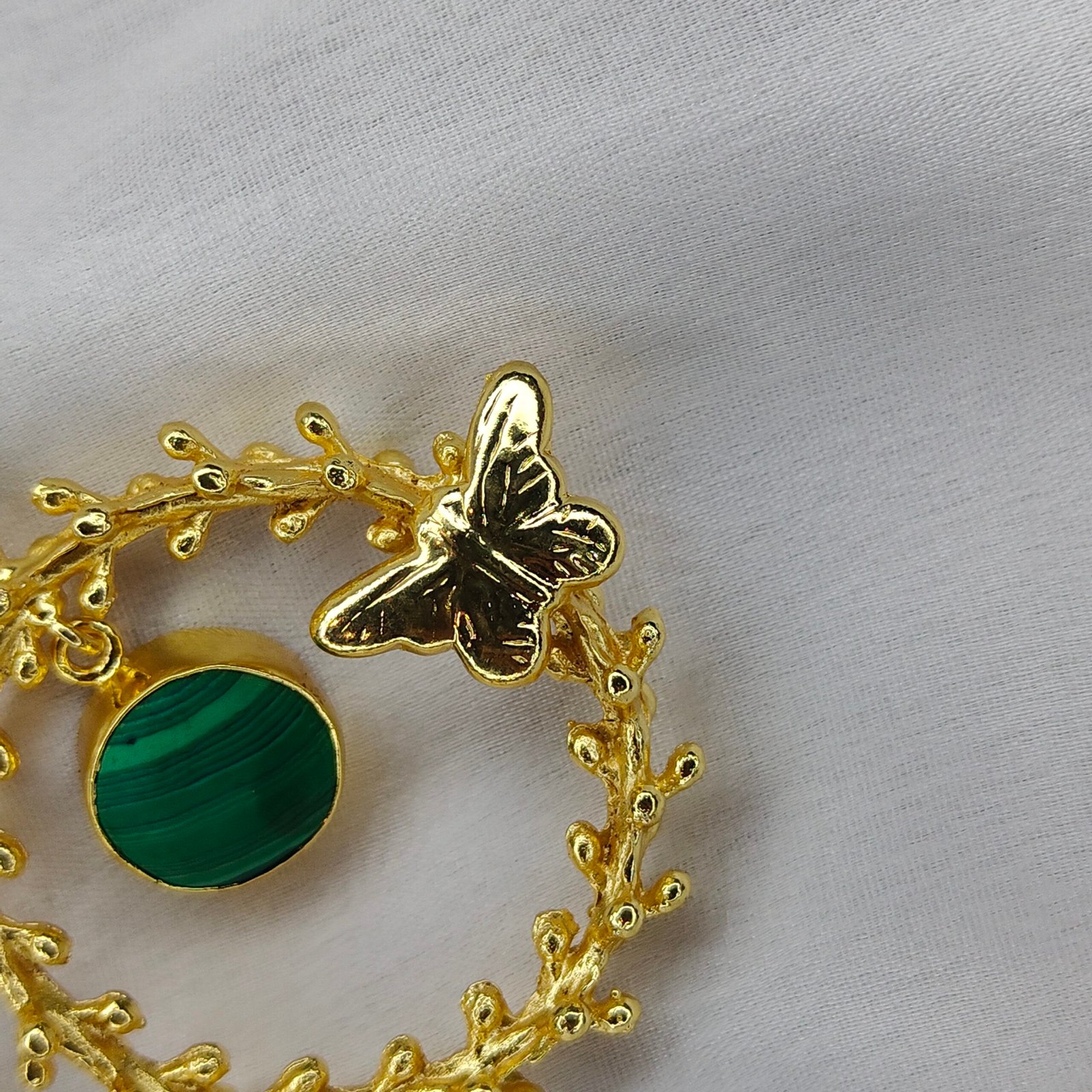 Jevaya Golden Butterfly Pearl Hoop Earrings with Green Marble-textured Stone Charm - Image 4