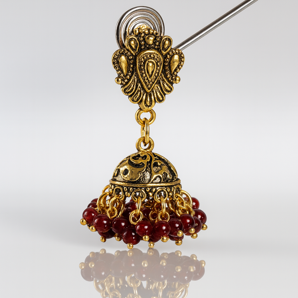 Jevaya Traditional Oxidised Antique Gold Jhumka Earrings with Red Bead Detailing - Image 3