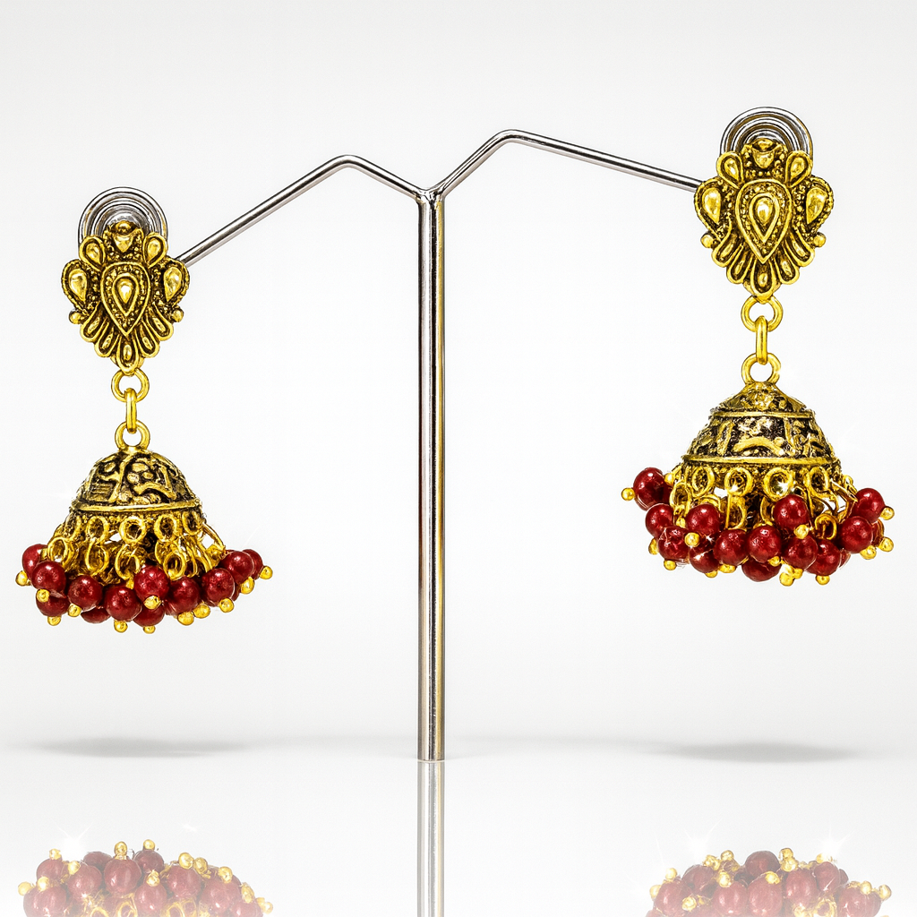 Jevaya Traditional Oxidised Antique Gold Jhumka Earrings with Red Bead Detailing