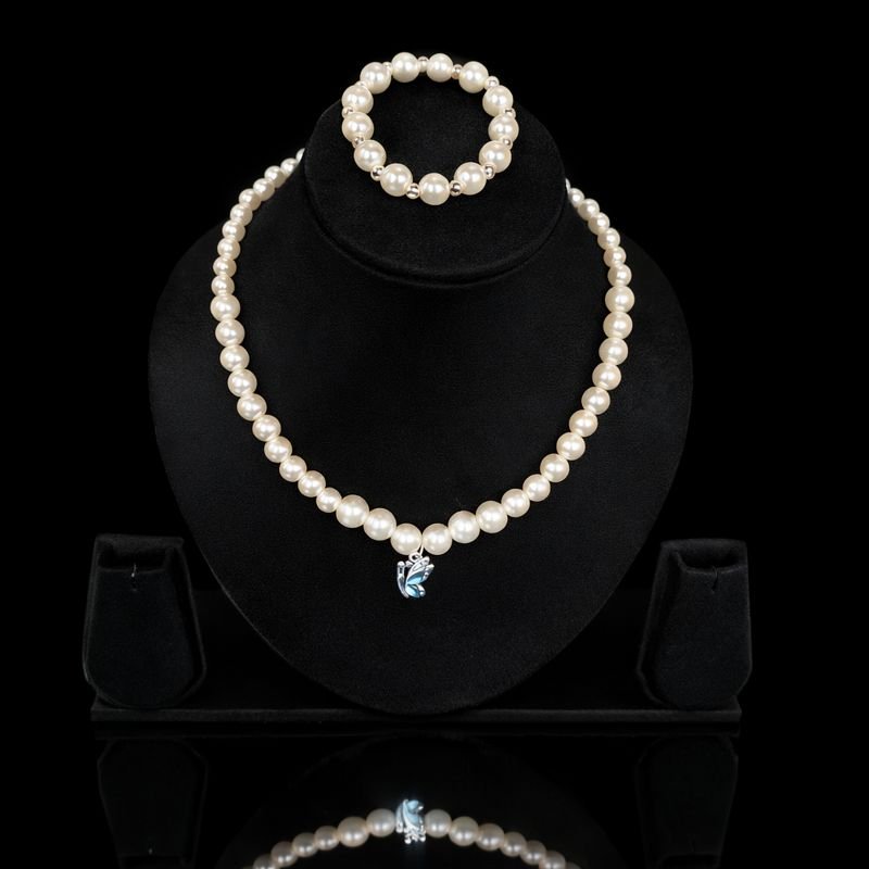 Jevaya Handcrafted Pearl Necklace Set with Butterfly Charm – Elegant & Timeless Jewelry - Image 3